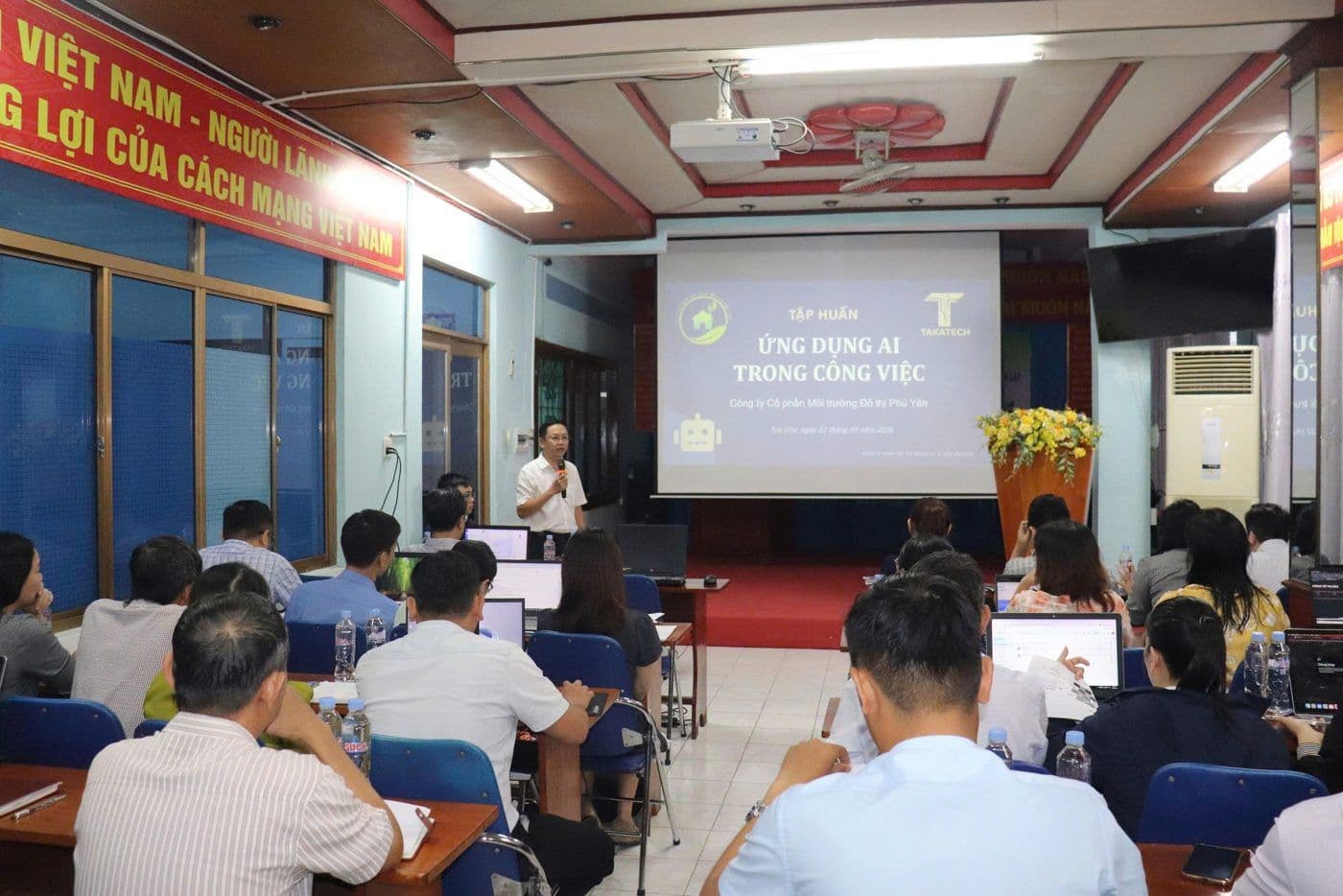 Trainees practising at an AI training class